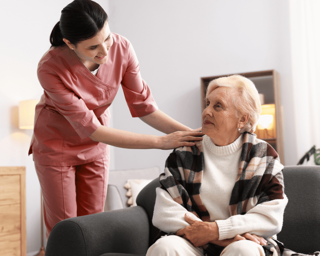 home aide talking with elderly woman